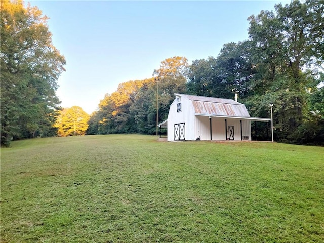 2900 Orchard Rd SW, Conyers, GA 30094 - view of green lawn with an outdoor structure and a wooded view