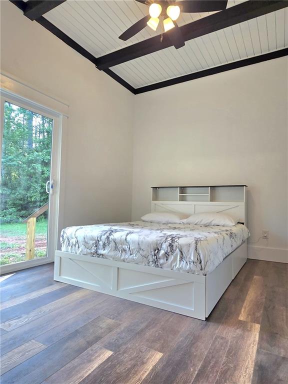 2900 Orchard Rd SW, Conyers, GA 30094 - bedroom with wooden ceiling, wood finished floors, access to exterior, ceiling fan, and baseboards