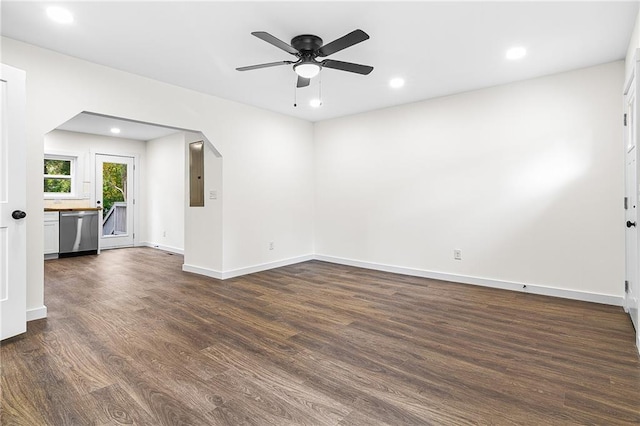 578 Cedar Ave, Atlanta, GA 30318 - spare room featuring a ceiling fan, electric panel, recessed lighting, dark wood-style flooring, and baseboards