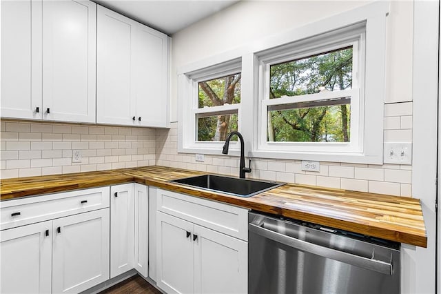 578 Cedar Ave, Atlanta, GA 30318 - kitchen featuring a sink, tasteful backsplash, dishwasher, and butcher block counters