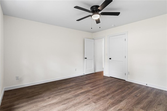 578 Cedar Ave, Atlanta, GA 30318 - unfurnished bedroom with ceiling fan, baseboards, and wood finished floors