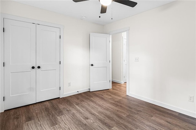 578 Cedar Ave, Atlanta, GA 30318 - unfurnished bedroom featuring wood finished floors, a closet, baseboards, and a ceiling fan