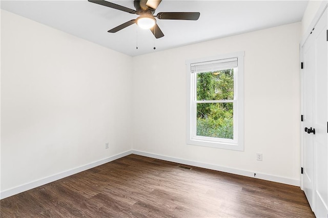 578 Cedar Ave, Atlanta, GA 30318 - empty room featuring dark wood-type flooring, visible vents, baseboards, and ceiling fan