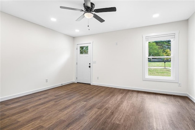 578 Cedar Ave, Atlanta, GA 30318 - unfurnished room featuring dark wood-type flooring, baseboards, a ceiling fan, and recessed lighting