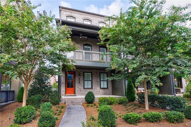 view of front of home with a balcony