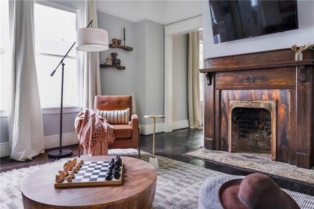 living area with hardwood / wood-style floors