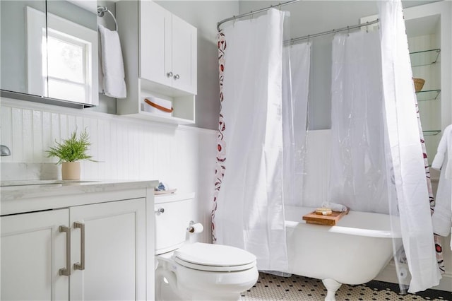 full bathroom featuring shower / bathtub combination with curtain, tile patterned flooring, vanity, and toilet