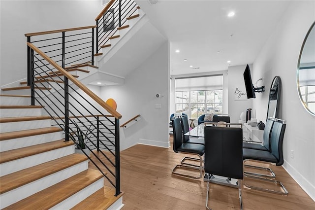 dining space featuring hardwood / wood-style floors