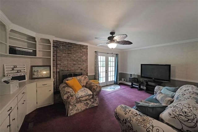 6880 Mark Turner Rd, Lithia Springs, GA 30122 - carpeted living area featuring french doors, ceiling fan, crown molding, built in features, and a brick fireplace
