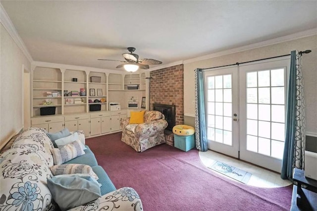 6880 Mark Turner Rd, Lithia Springs, GA 30122 - carpeted living room with french doors, ornamental molding, a ceiling fan, and built in features