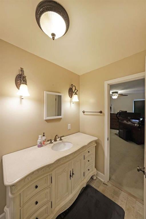 6880 Mark Turner Rd, Lithia Springs, GA 30122 - bathroom with vanity and baseboards