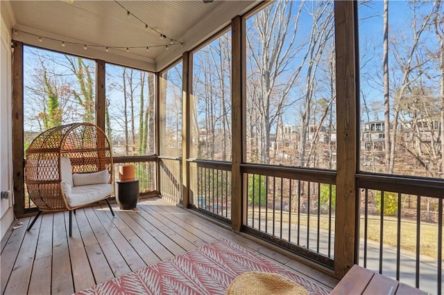 unfurnished sunroom with plenty of natural light