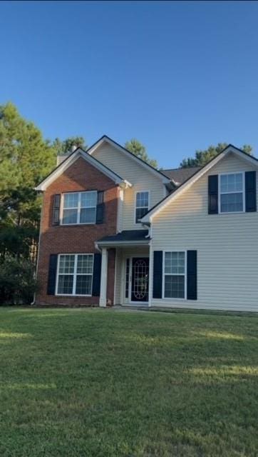 635 Beddick Ln, Atlanta, GA 30349 - traditional home with a front yard