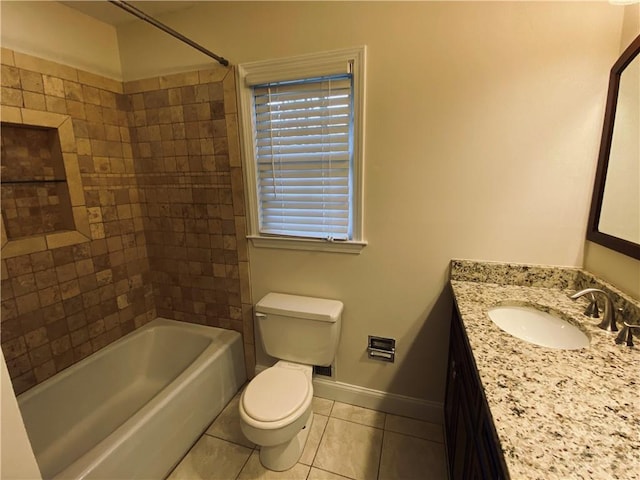 full bath featuring vanity, baseboards,  shower combination, tile patterned floors, and toilet