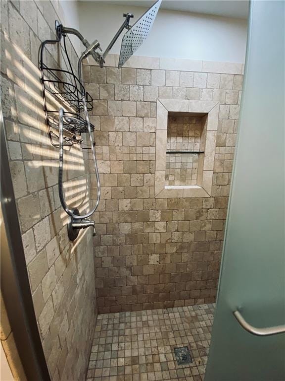 full bathroom with a shower stall