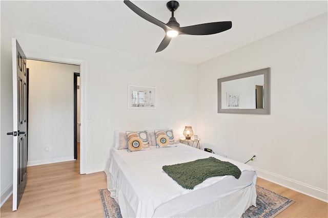 bedroom featuring ceiling fan and light hardwood / wood-style floors