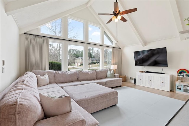 living room with ceiling fan, high vaulted ceiling, beam ceiling, and hardwood / wood-style floors