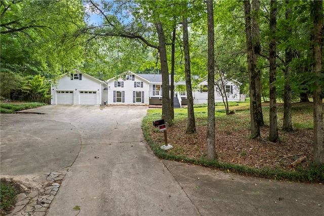 3345 Bomar Rd, Douglasville, GA 30135 - view of front of home featuring concrete driveway and a garage