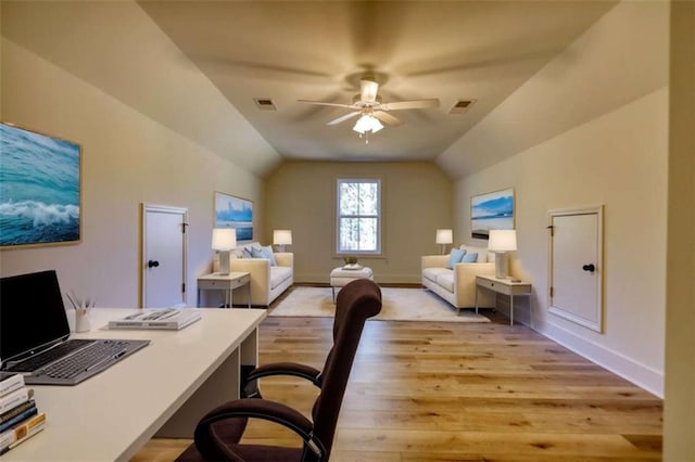 office area featuring lofted ceiling, ceiling fan, and light wood-type flooring