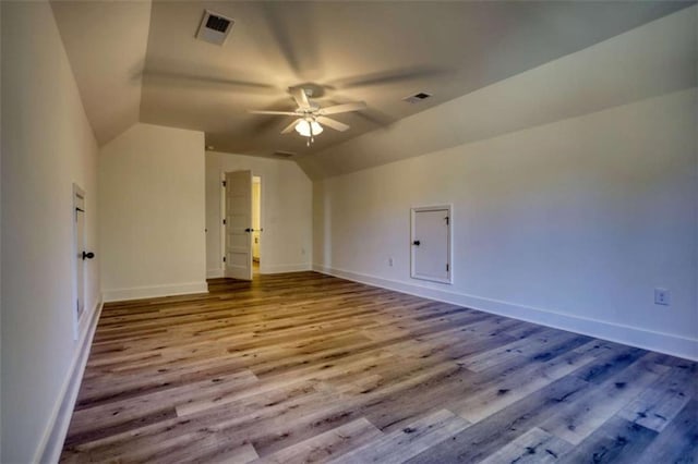 bonus room with ceiling fan, lofted ceiling, and light hardwood / wood-style flooring