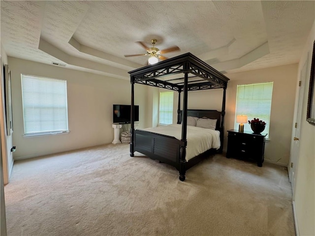 105 Avonwood Cir, Locust Grove, GA 30248 - carpeted bedroom with a textured ceiling and ceiling fan