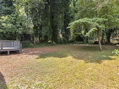 view of yard with a deck