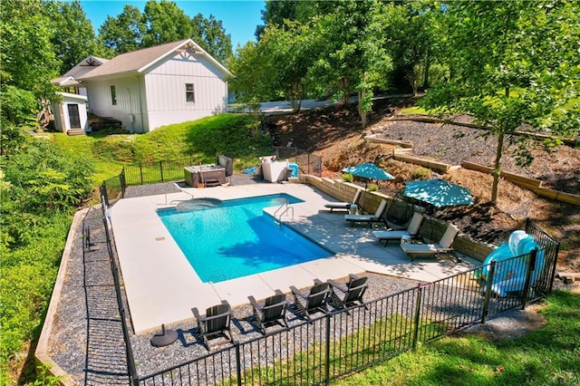 view of swimming pool featuring a patio