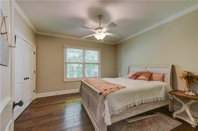 bedroom with ornamental molding, ceiling fan, and dark hardwood / wood-style floors