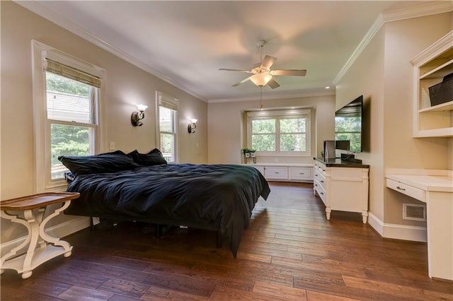 bedroom featuring multiple windows, dark hardwood / wood-style flooring, and ceiling fan