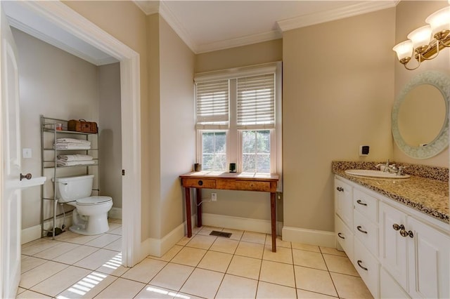 bathroom featuring vanity, tile patterned floors, toilet, and ornamental molding