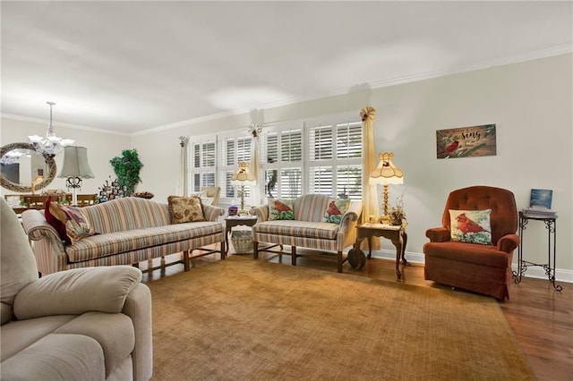 103 Mims Dr, Calhoun, GA 30701 - living area with a chandelier, ornamental molding, wood finished floors, and baseboards
