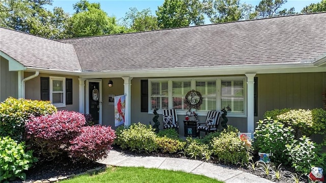 103 Mims Dr, Calhoun, GA 30701 - view of front facade featuring a shingled roof and a porch