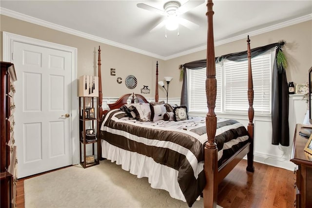 103 Mims Dr, Calhoun, GA 30701 - bedroom featuring ornamental molding, wood finished floors, a wainscoted wall, and ceiling fan
