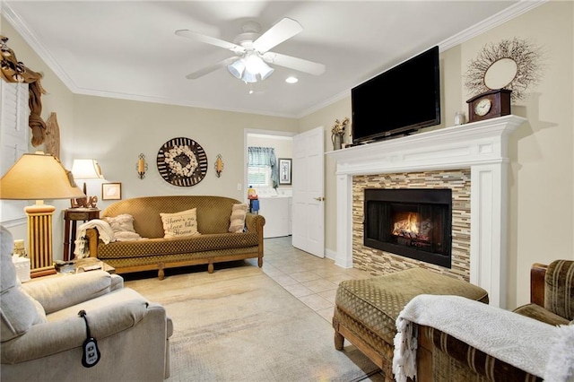 103 Mims Dr, Calhoun, GA 30701 - living area with light tile patterned flooring, a tiled fireplace, ceiling fan, ornamental molding, and recessed lighting