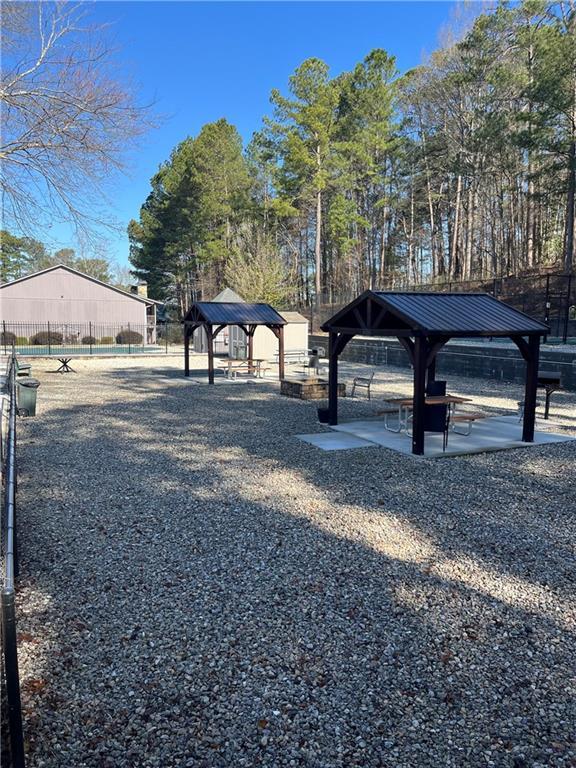 exterior space with a gazebo and fence