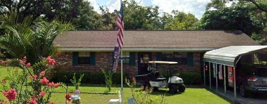 137 Timber Ln, Waycross, GA 31503 - view of front facade featuring a front lawn and brick siding