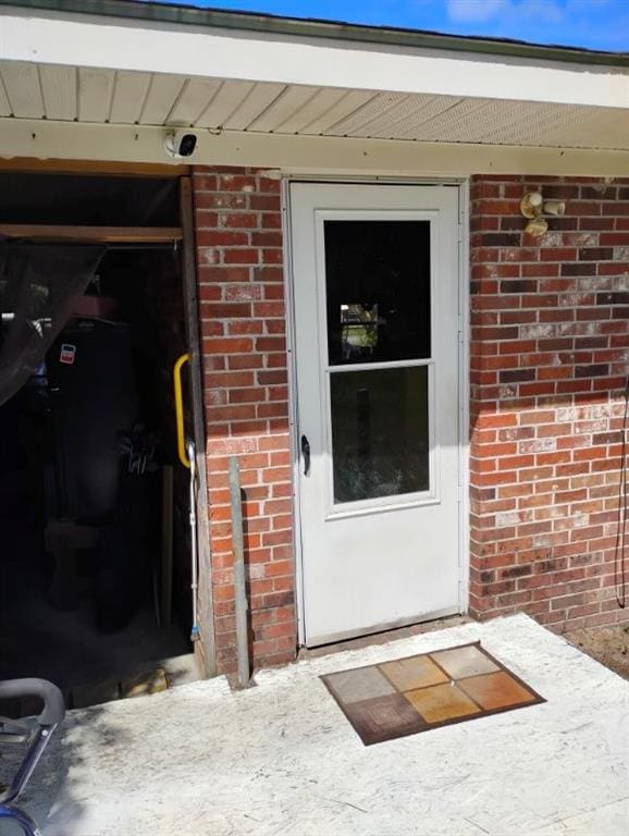 137 Timber Ln, Waycross, GA 31503 - doorway to property with brick siding