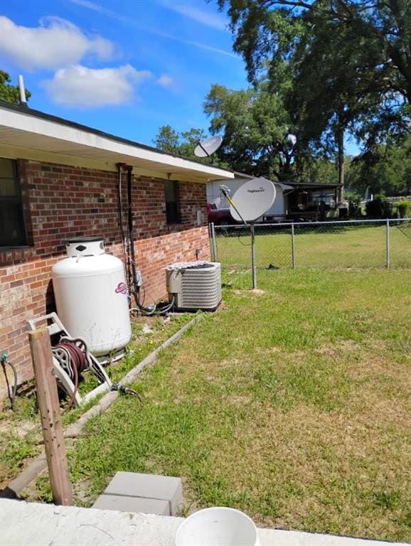 137 Timber Ln, Waycross, GA 31503 - view of yard featuring central air condition unit