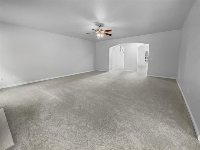 interior space featuring ceiling fan and carpet floors