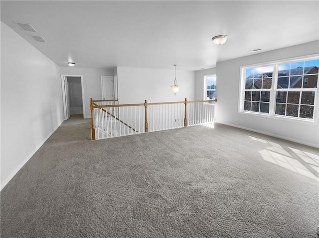 unfurnished room with carpet