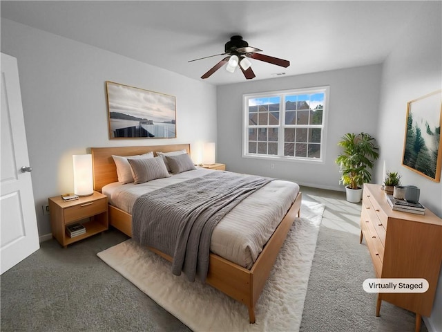 carpeted bedroom with ceiling fan