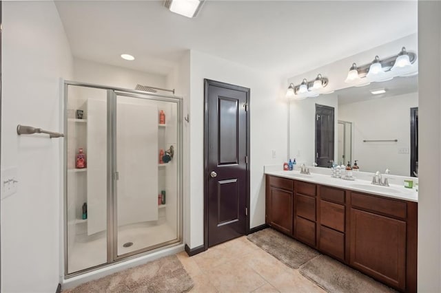 4430 Cedar Bridge Walk, Suwanee, GA 30024 - full bathroom featuring double vanity, a shower stall, tile patterned flooring, and a sink