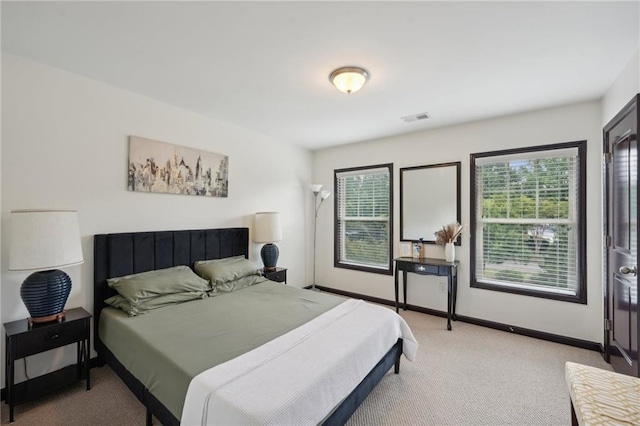 4430 Cedar Bridge Walk, Suwanee, GA 30024 - bedroom with light carpet, baseboards, and visible vents