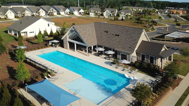 view of swimming pool with a patio area