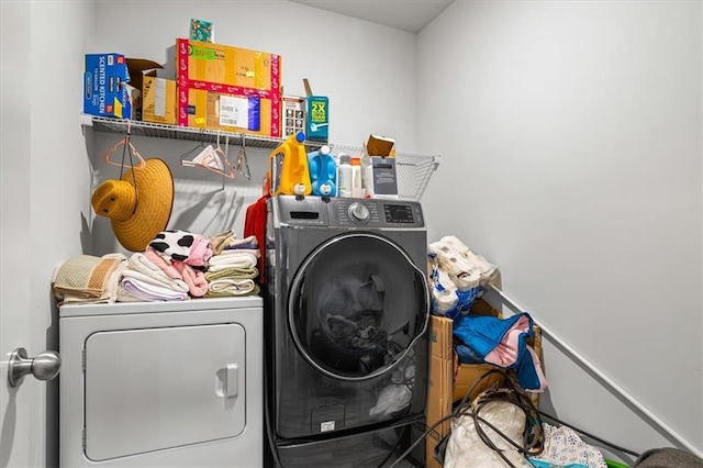 laundry area featuring washing machine and dryer