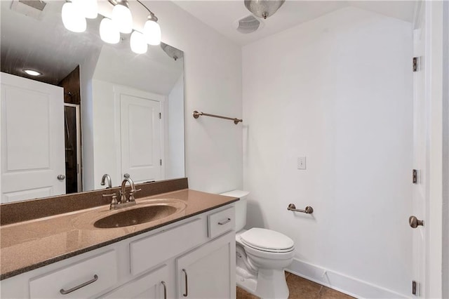 bathroom with tile patterned floors, vanity, toilet, and an enclosed shower