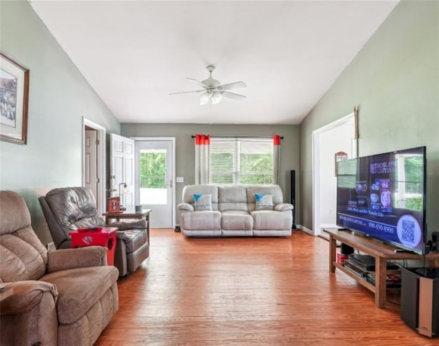 904 Corinth Five Points Rd, Buchanan, GA 30113 - living room with vaulted ceiling, wood finished floors, and a ceiling fan