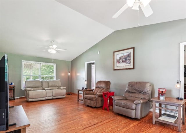 904 Corinth Five Points Rd, Buchanan, GA 30113 - living area featuring ceiling fan, wood finished floors, and vaulted ceiling