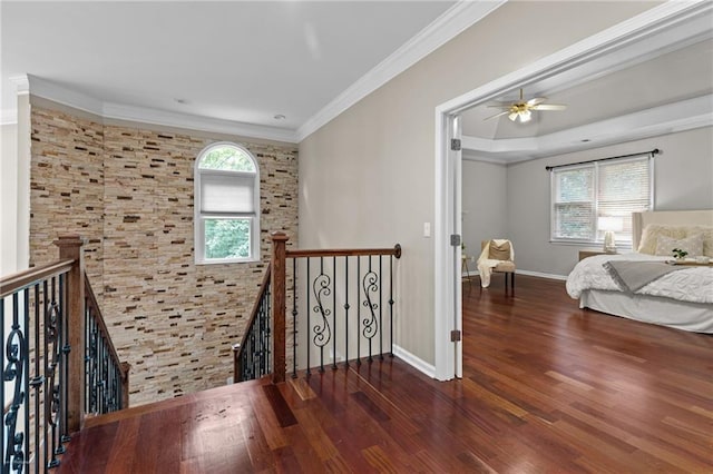 2990 Hearthstone Dr, Cumming, GA 30041 - hall featuring an upstairs landing, wood finished floors, ornamental molding, and baseboards
