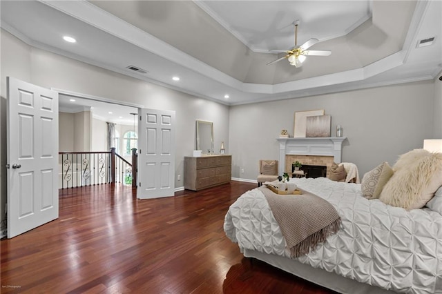 2990 Hearthstone Dr, Cumming, GA 30041 - bedroom featuring wood finished floors, ornamental molding, recessed lighting, baseboards, and a fireplace